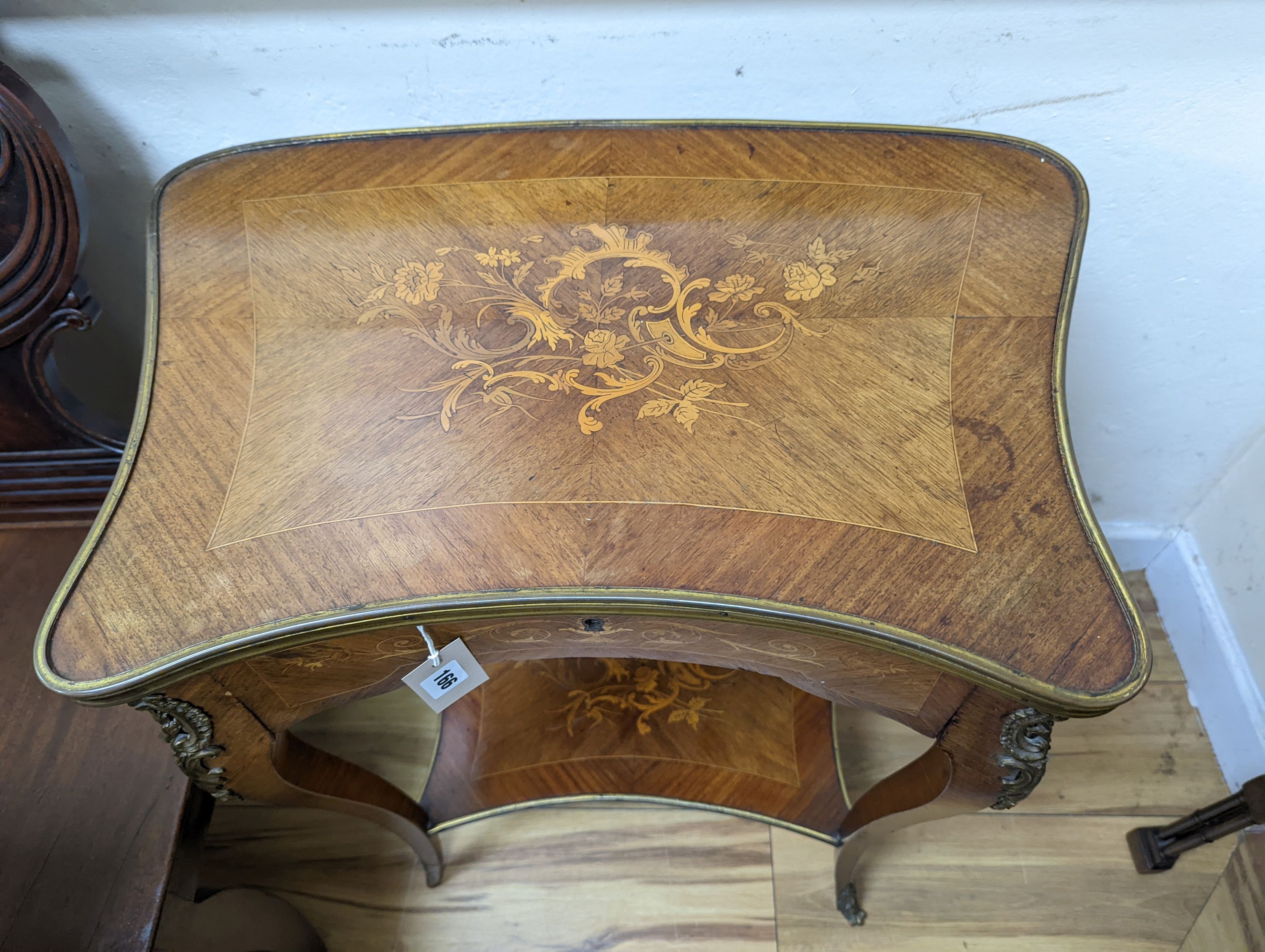 A Louis XV style Kingwood and marquetry inlaid gilt metal mounted two tier side table, width 58cm, depth 37cm, height 74cm